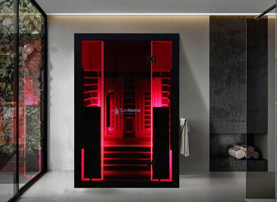 Rendering of the Sun Home Eclipse 2-Person sauna glowing red in a bathroom
