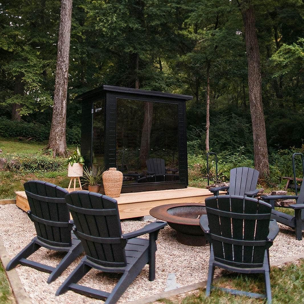 Sun Home Luminar 5-Person on a wood deck by a fire pit in the woods