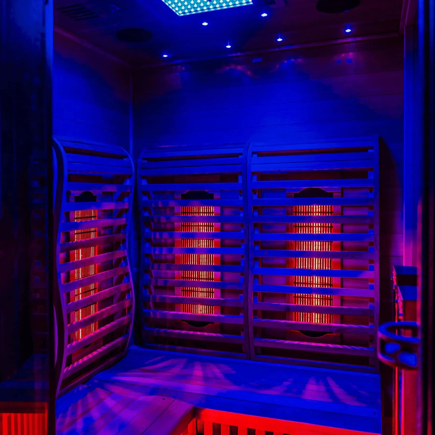 Cedar bench and heater panels inside the Sun Home Luminar 2-Person