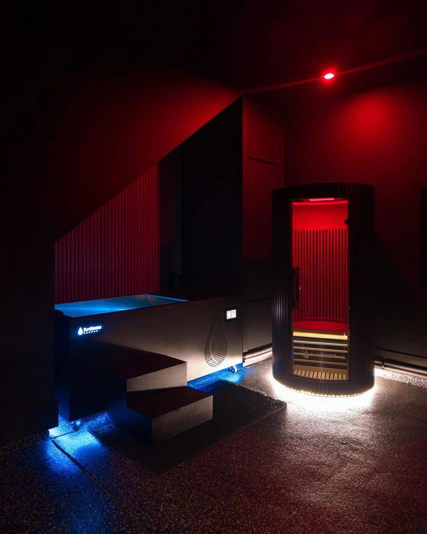 Sun Home Pod beside a cold plunge in a dark spa room
