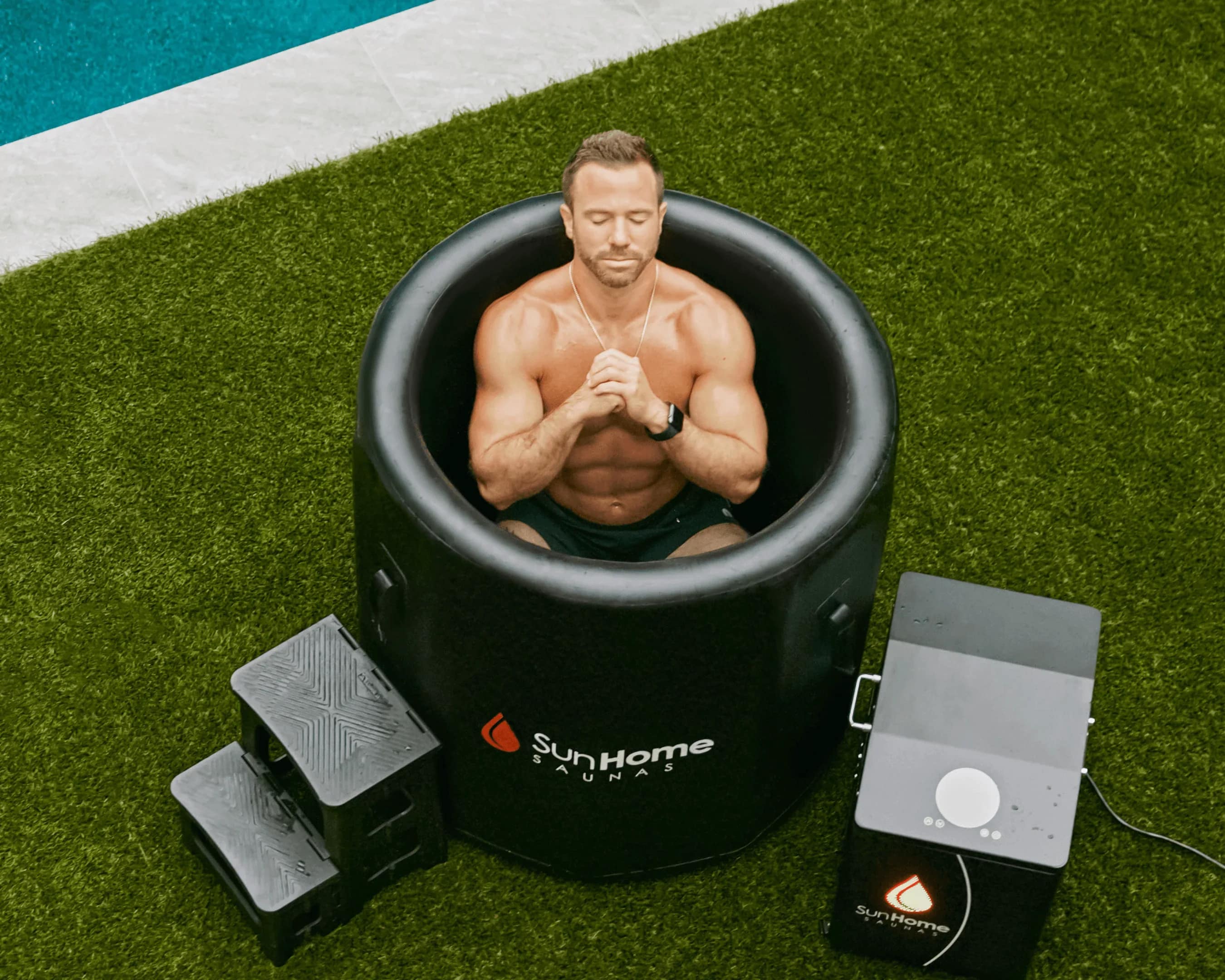 Overhead view of a man seated in the Sun Home Cold Plunge Vertical