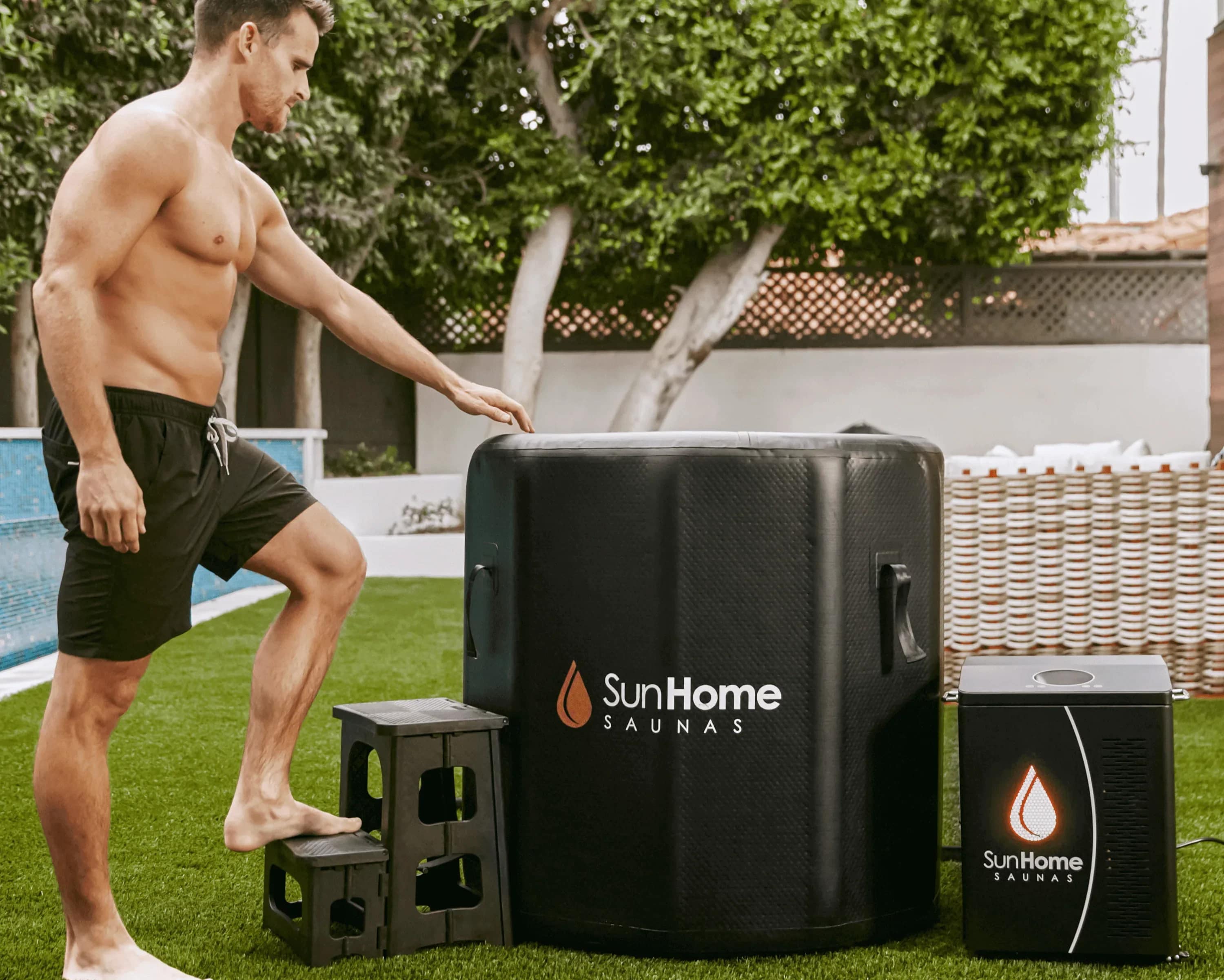 Man stepping up into the Sun Home Cold Plunge Vertical