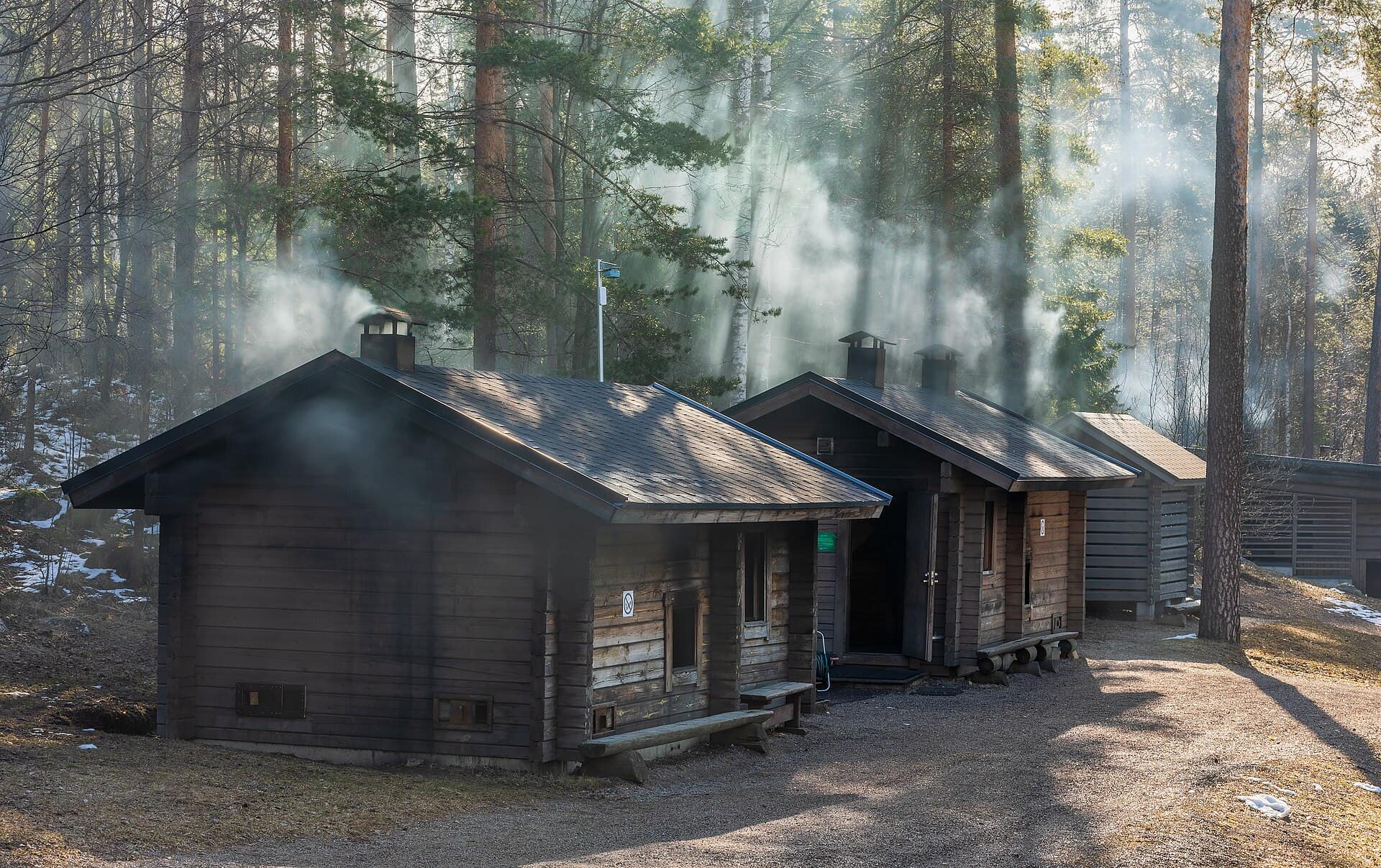 Smoke drifts from the public smoke saunas at Kuusijärvi in Vantaa, Finland.